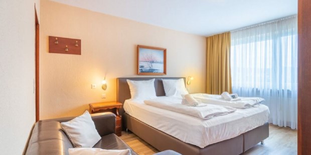 Tagungshotels - Hotelbar - Gleichen - Zimmerbeispiel - Benessere Hotelbetriebs GmbH - Waldhotel Soodener-Hof